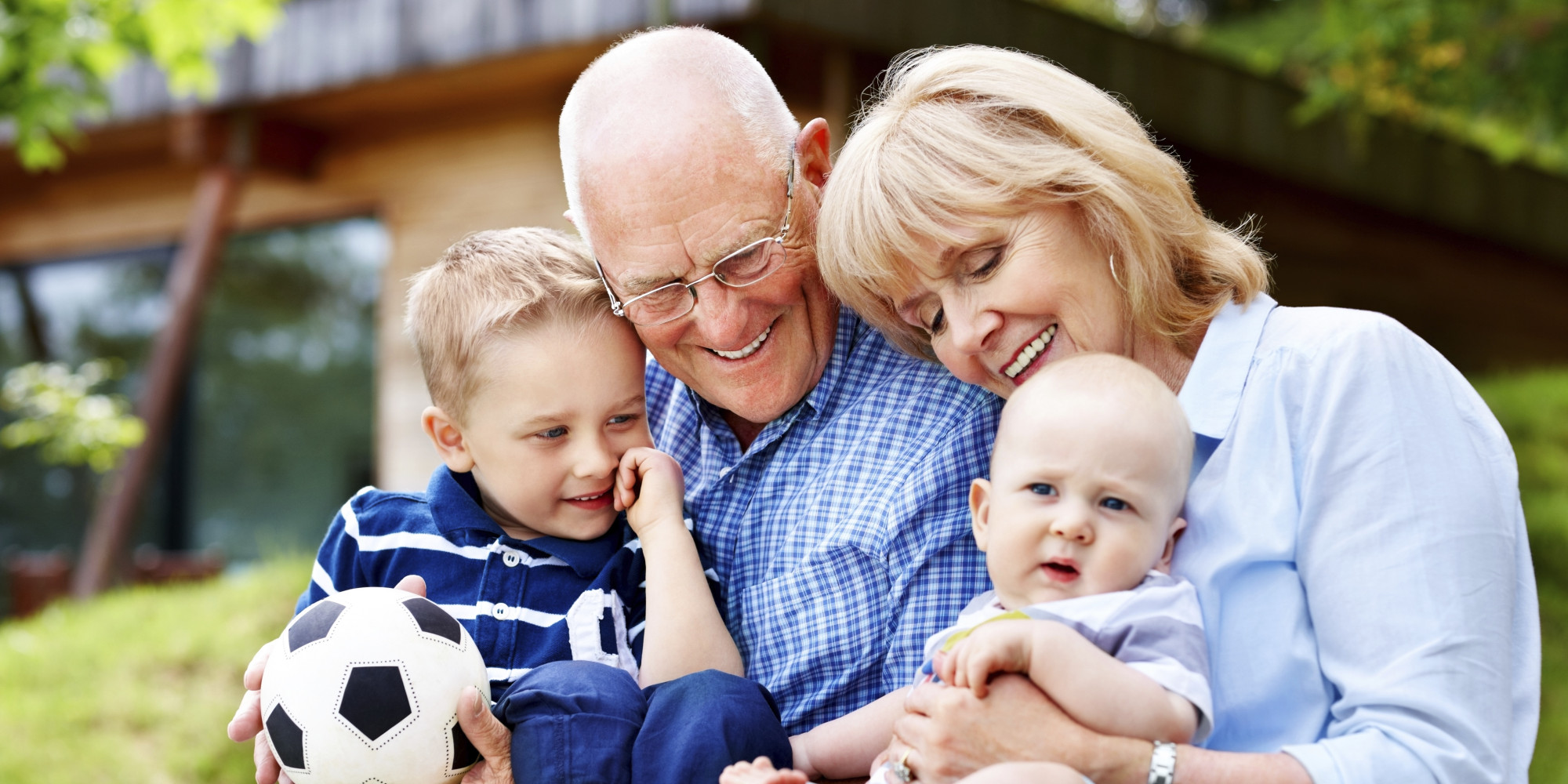 Happy grandparents and grandchildren - Outdoors